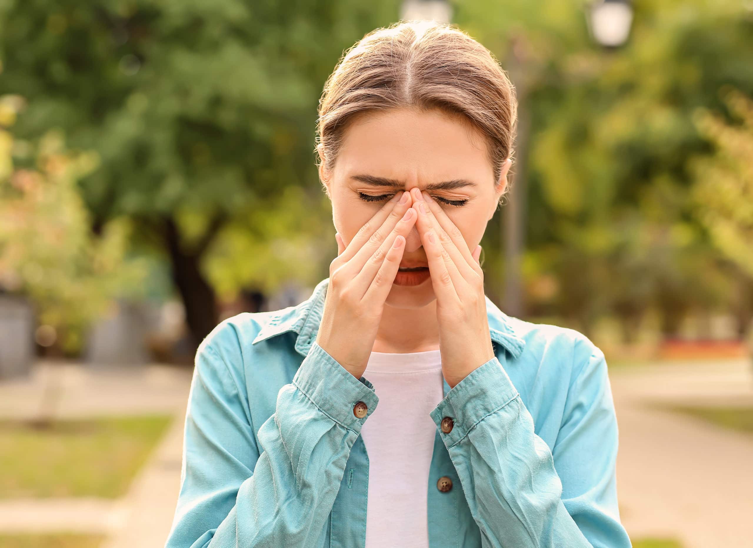 Young,Woman,Suffering,From,Allergy,Outdoors